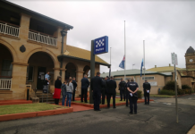 Warwick police observe moment of silence for Senior Constable David Masters