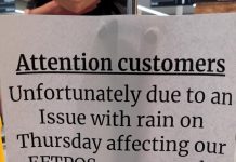 Curtain of water from rain dump closes Woolworths for hours