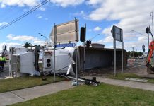 Truck driver unharmed in rollover, onlookers praised for quick response