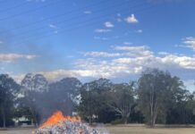Waste truck forced to dump burning load